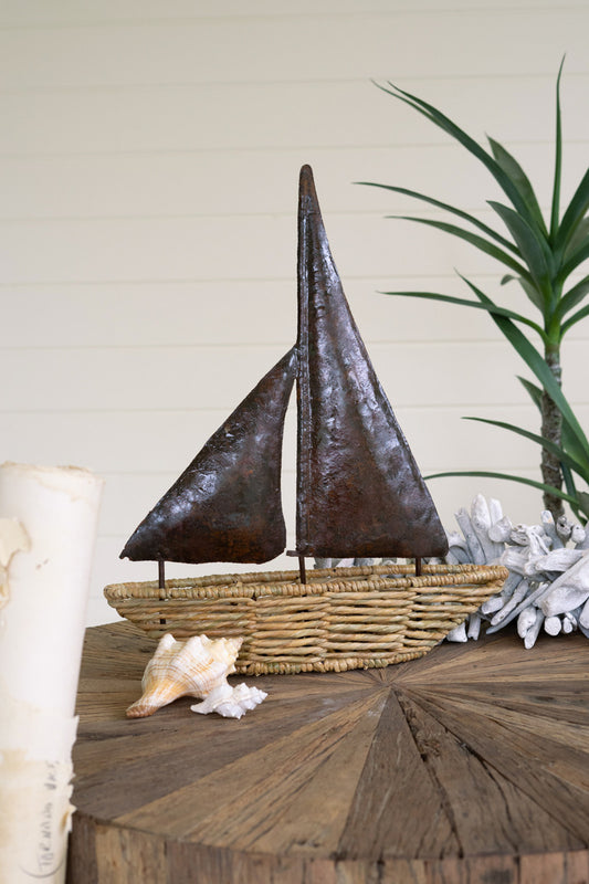 SEAGRASS BOAT WITH HAND HAMMERED METAL SAILS