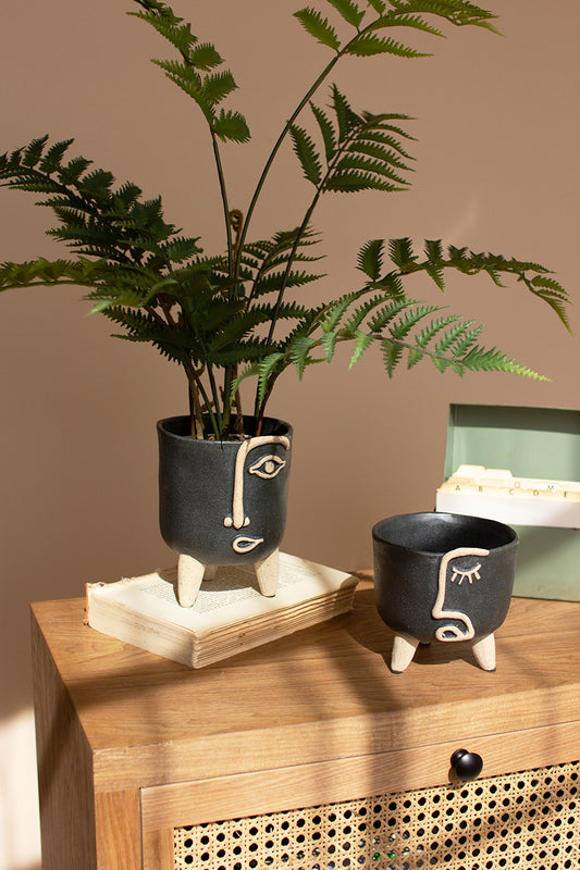 SET OF TWO CERAMIC ABSTRACT FACE PLANTERS