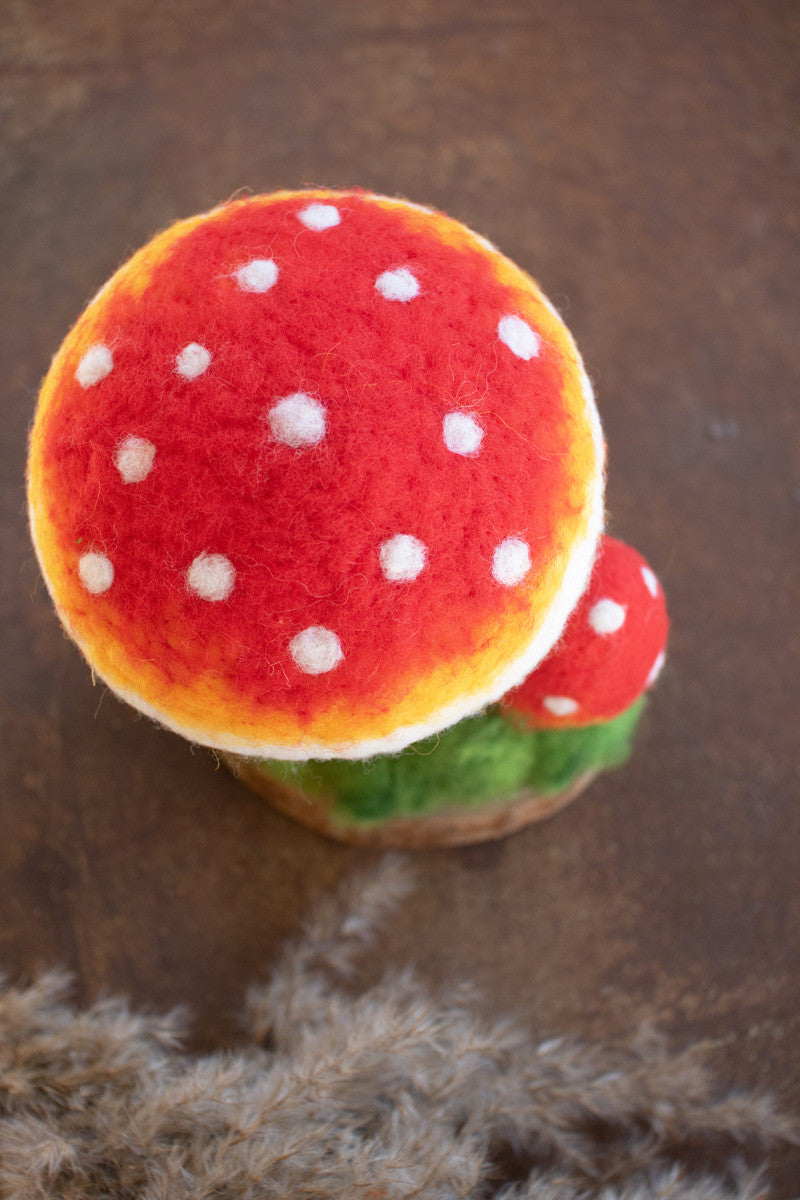 FELT MUSHROOMS ON A WOODEN BASE