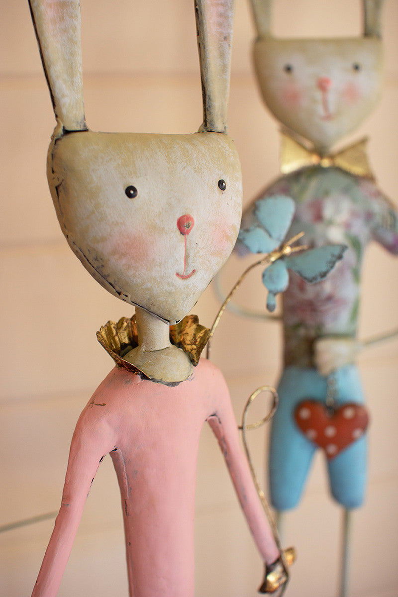 SET OF TWO PAINTED METAL LONG-LEGGED BOY AND GIRL RABBITS