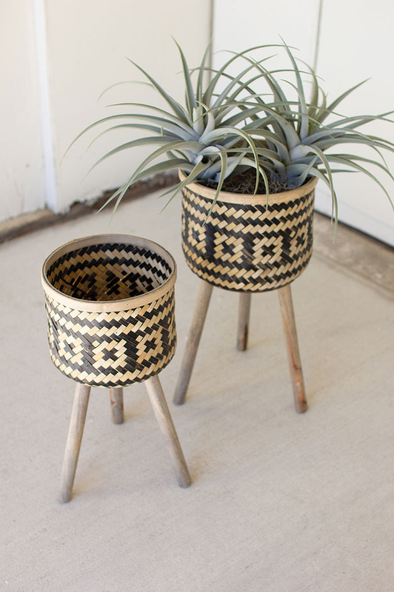 SET OF TWO WOVEN BLK & NAT BAMBOO PLANT STANDS W WOOD LEGS
