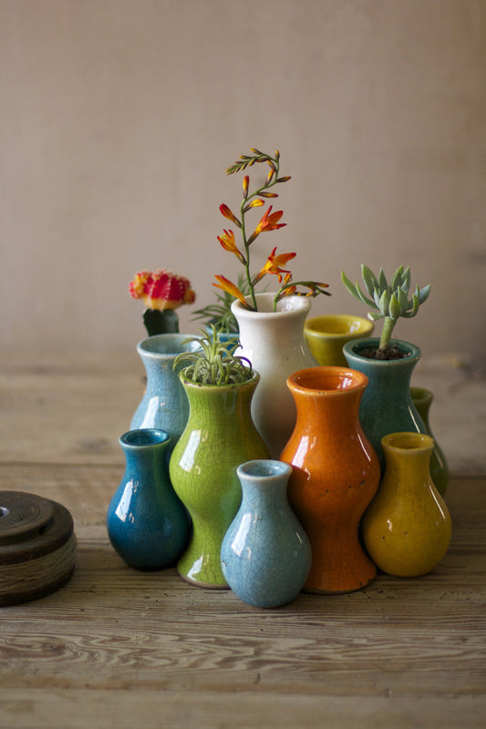 SET OF THIRTEEN MULTI-COLORED CERAMIC VASES