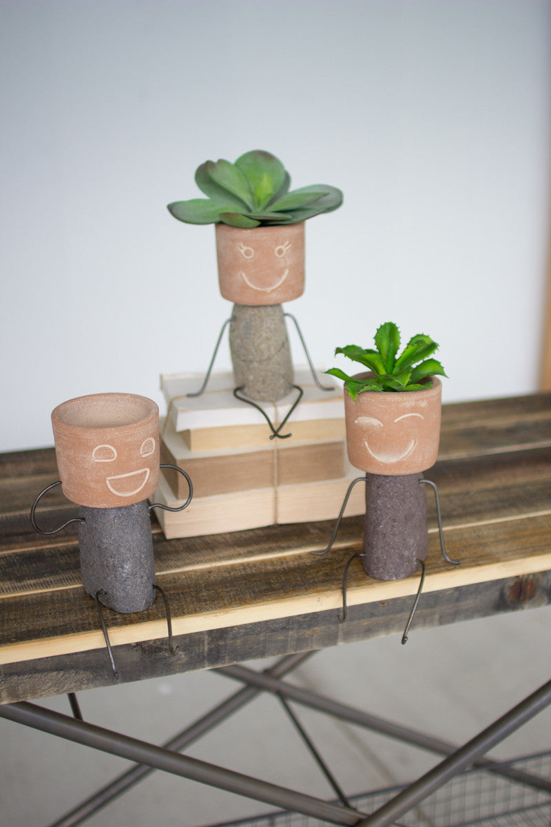 SET OF THREE CLAY & RIVER ROCK POT HEAD SHELF SITTERS