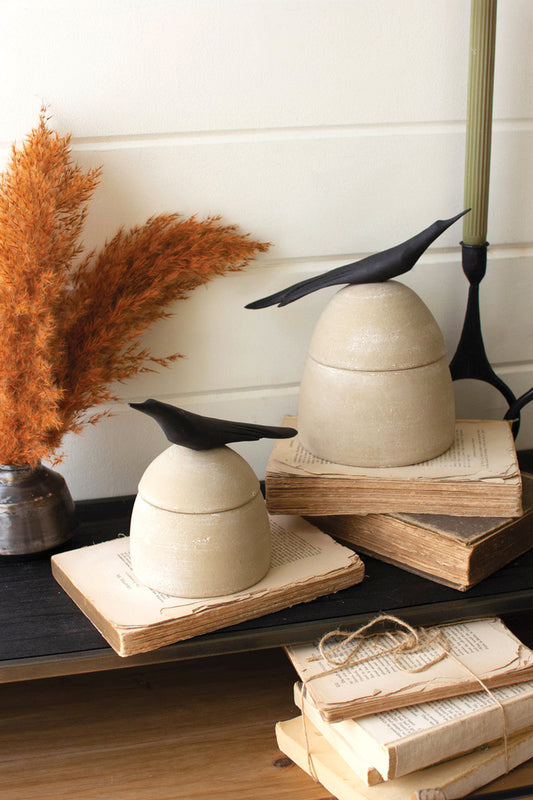 SET OF TWO CLAY CANISTERS WITH WOODEN BIRD HANDLES