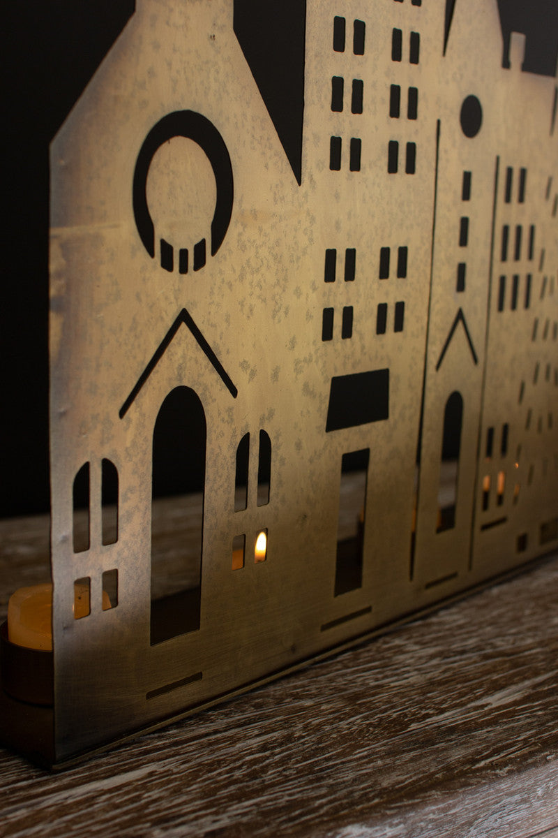 ANTIQUE BRASS VILLAGE WITH CANDLE HOLDERS