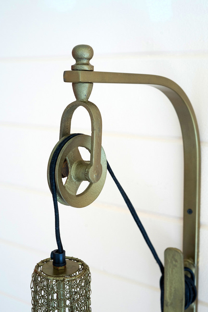 ANTIQUE BRASS PULLEY WALL LAMP WITH WIRE BRASS SHADE