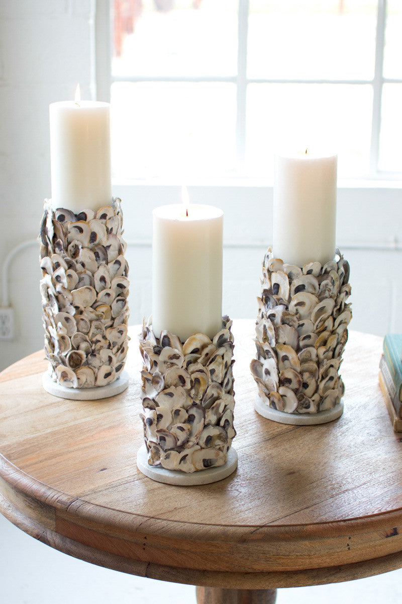 SET OF THREE OYSTER SHELL PILLAR CANDLE HOLDERS